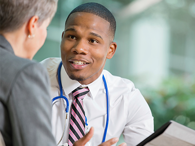 Doctor consulting patient